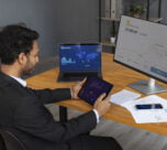 business person looking finance graphs 1