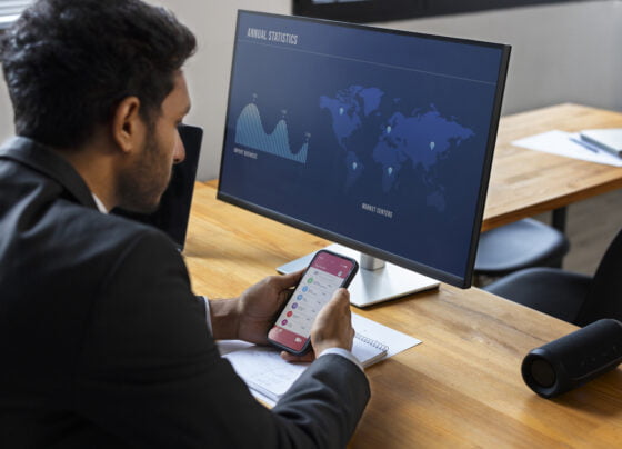 business person looking finance graphs