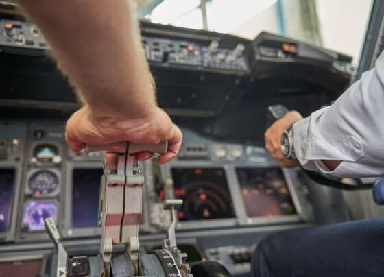 cropped photo airman pushing throttle lever cockpit aircraft 447912 4596